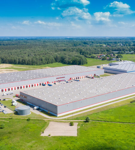 Logistics center in industrial city zone, industrial building, warehouse